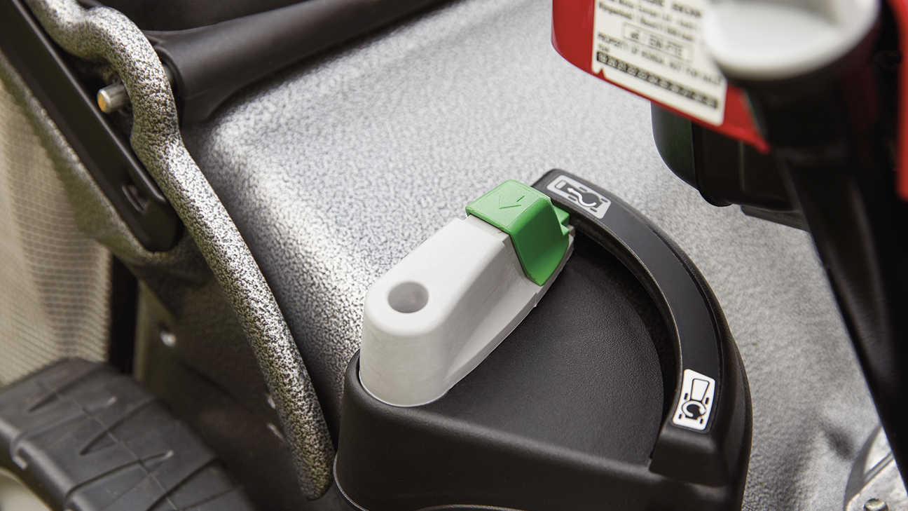 close up of honda izy petrol lawnmower versamov selective mulching controls