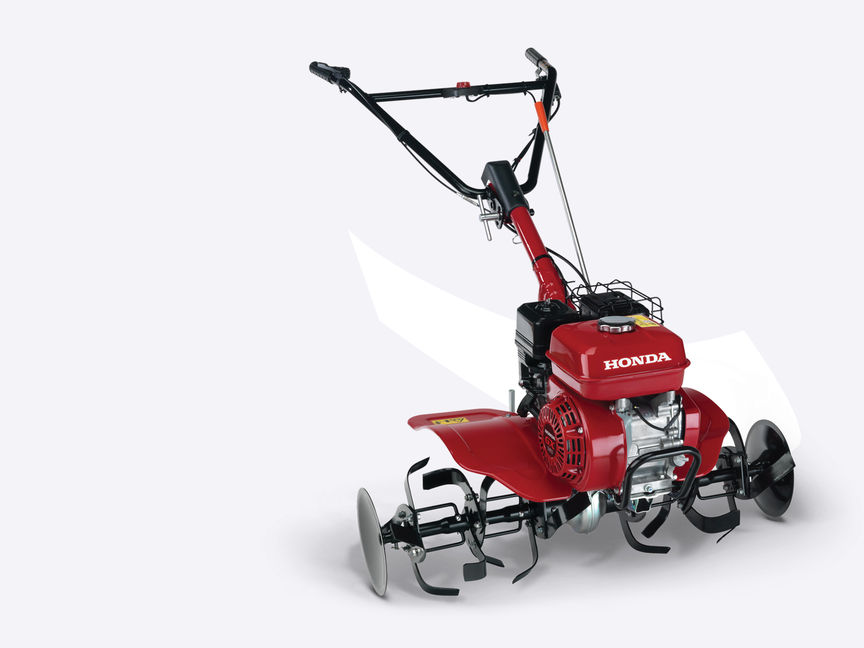 Front three-quarter, right facing Compact tiller.