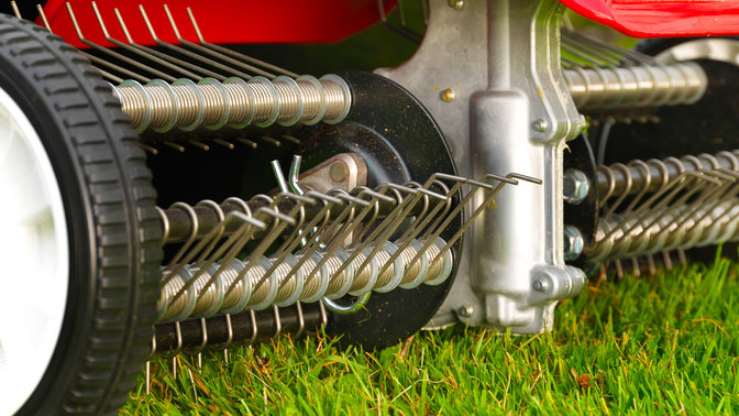 Close up of scarifier, garden location.