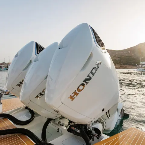 Close.up of BF350 engines on the back of the boat in a sea location.