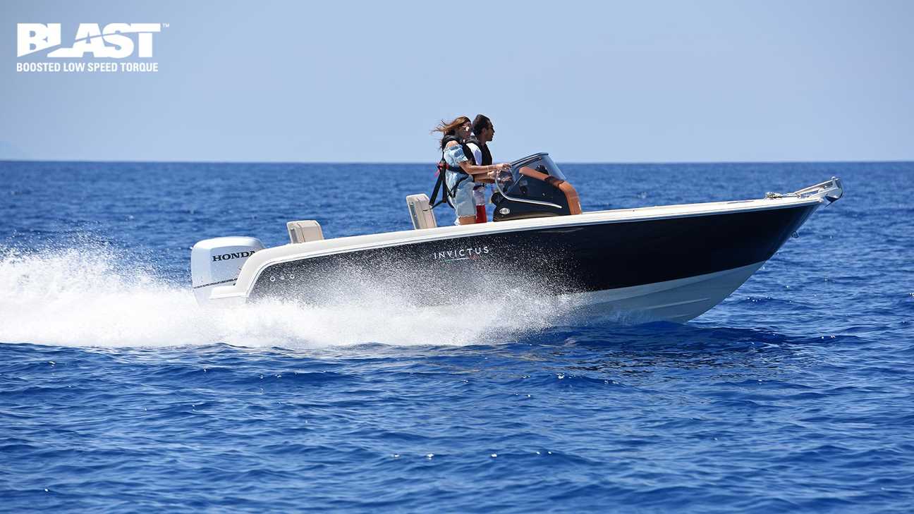 side view of couple steering boat powered by honda outboard engines
