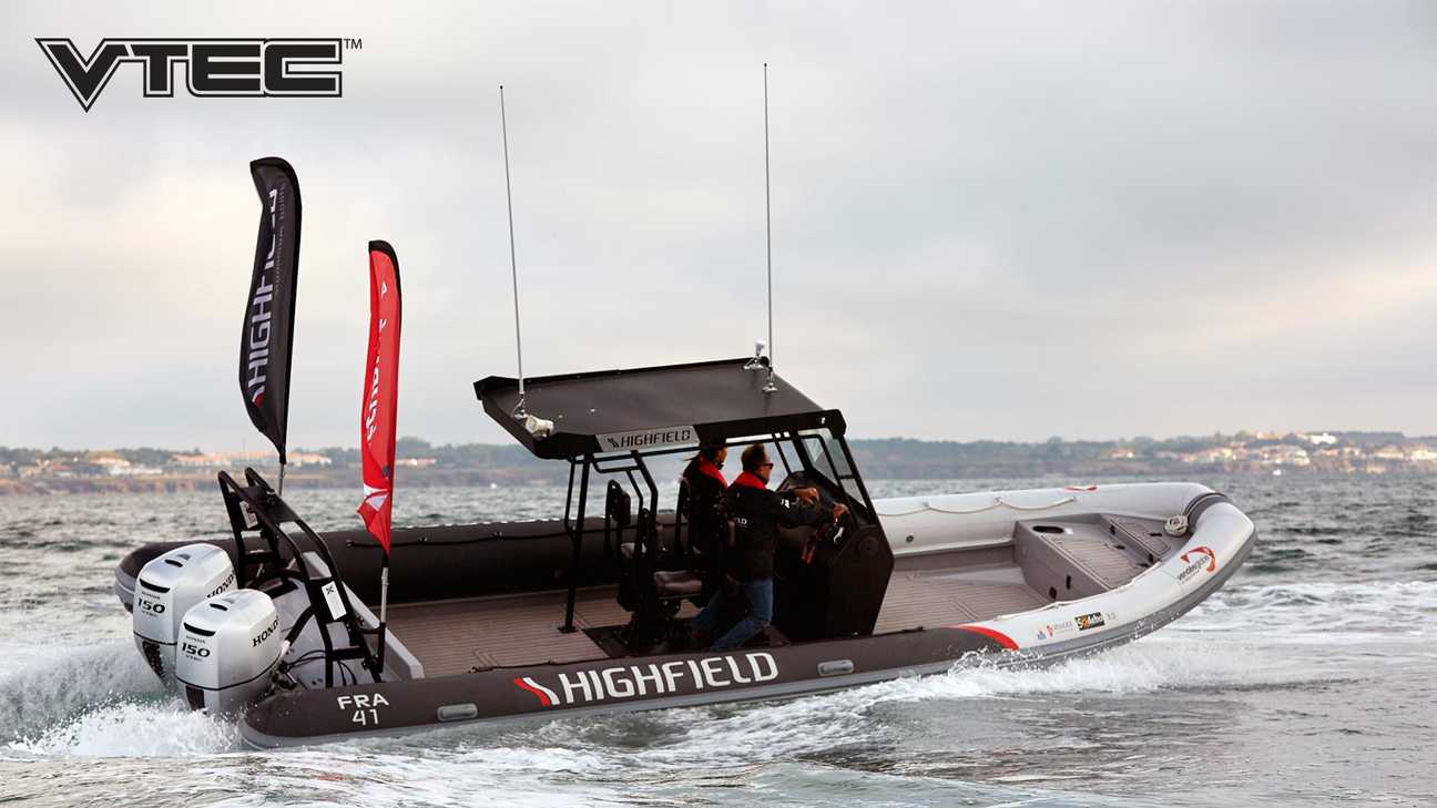 side view of people steering highfield boat powered by a honda outboard engines