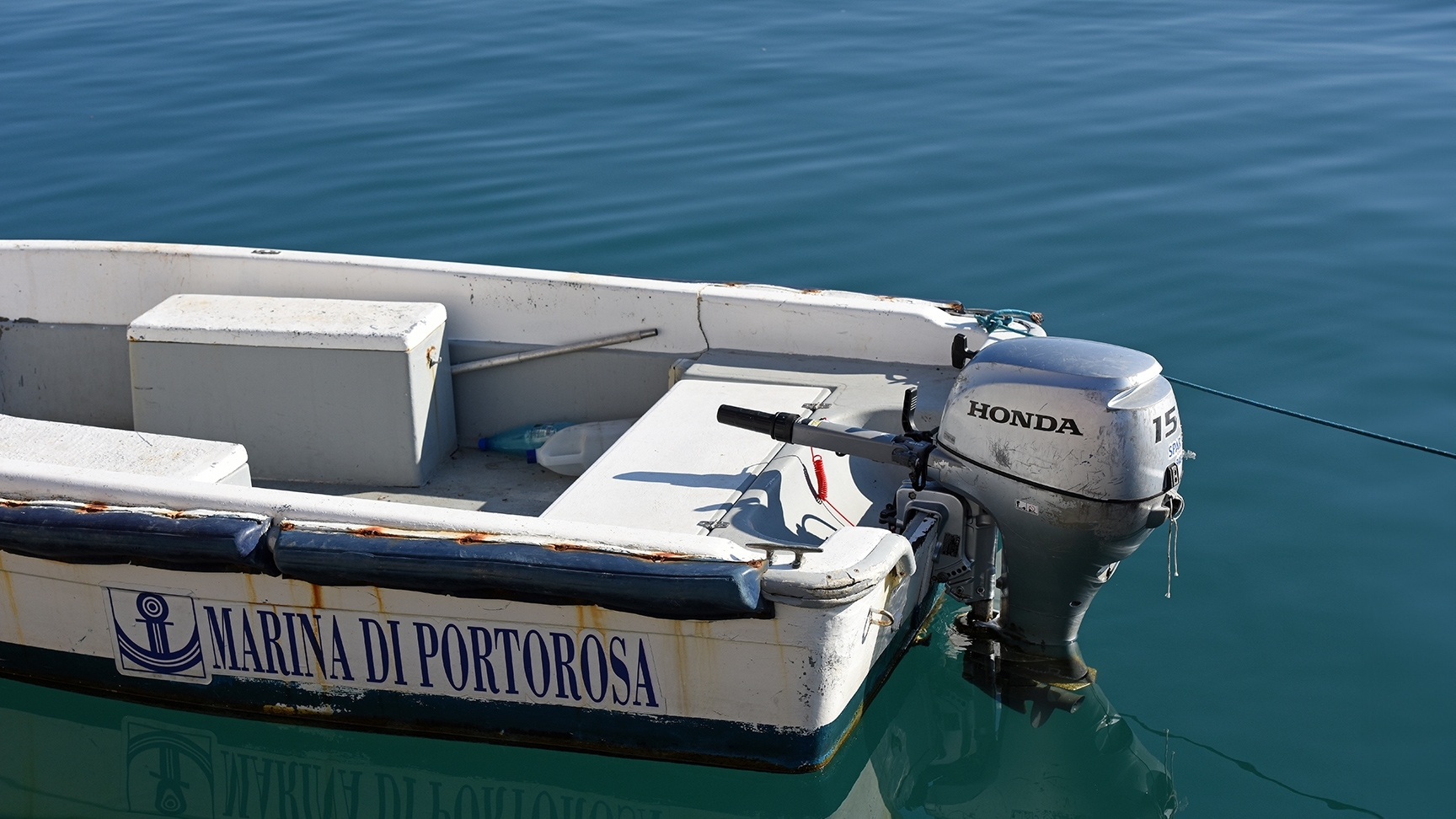 Honda BF15 engine on boat in the water.
