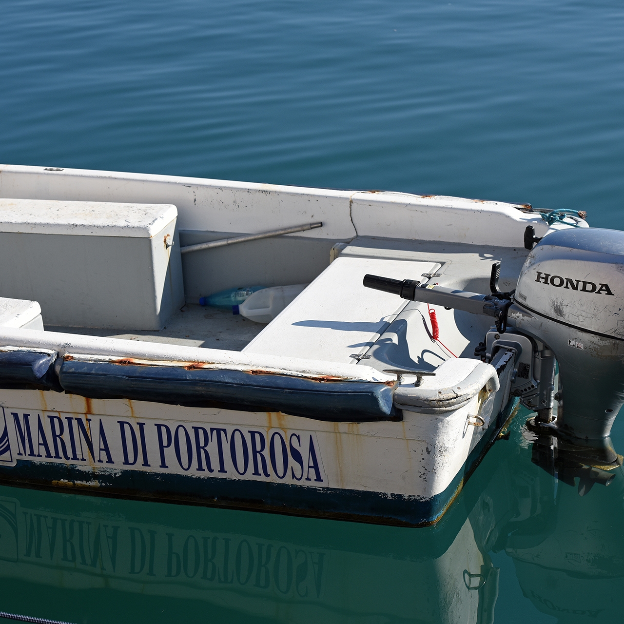 Honda BF15 engine on boat in the water.