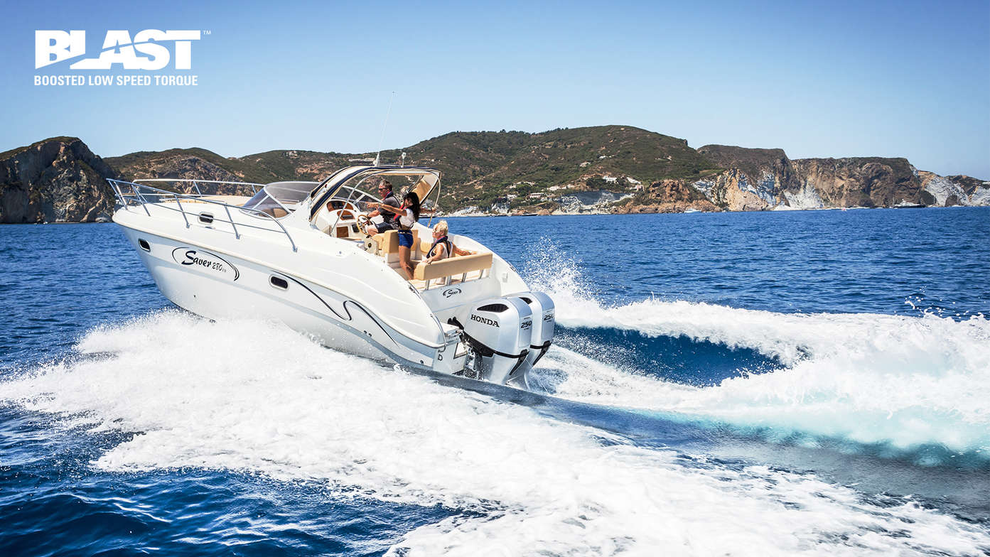 side view of people steering a boat fitted with a honda outboard engine with blast technology