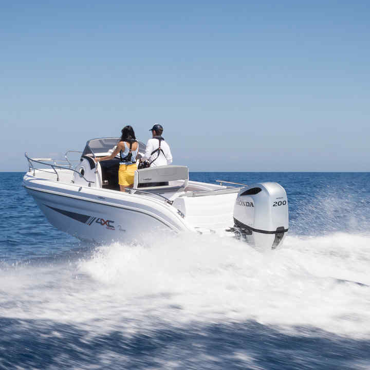 Boat out on the water with Honda V6 engine.