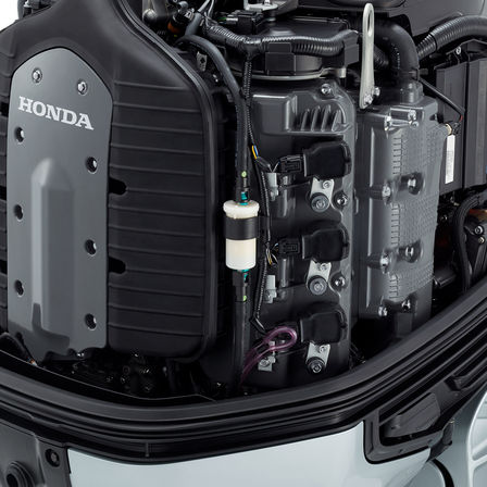 close up of the inside of a honda marine engine