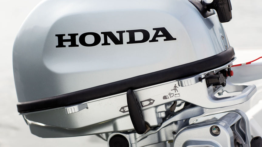 side close up view of honda outboard engine