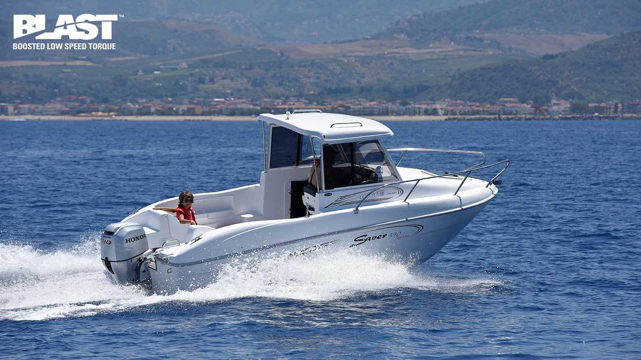 side angled view of people on a boat powered by a honda marine engine