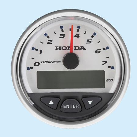 close up of a honda outboard engine speedometer
