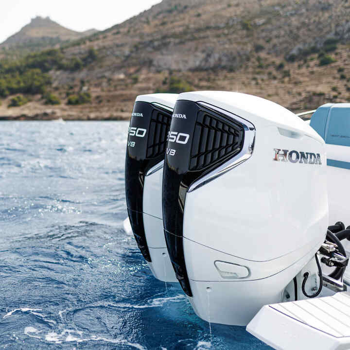 Man steering a speed boat