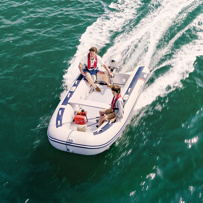 aerial view of people fishing whilst on a honwave inflatable boat