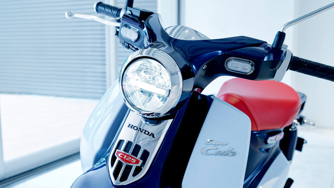 close up of the front of a honda super cub 125cc motorbike