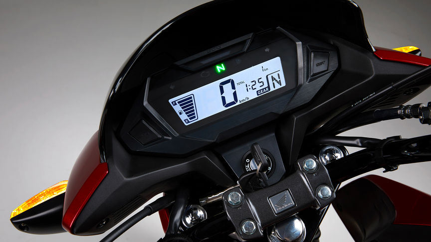 Honda CB125F red studio shot focus on smart digital dash