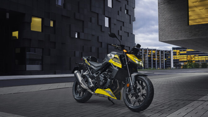 Honda C1000R with riders on road