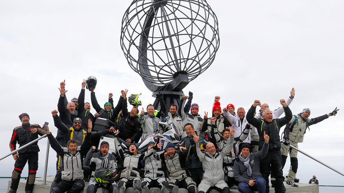 Honda Adventure Roads participants celebrating together.