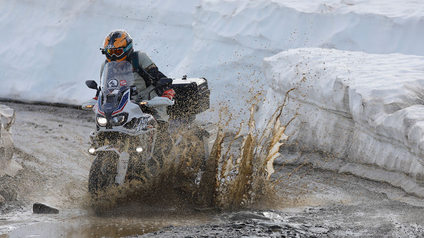 Honda Africa Twin being ridden through Nordkapp.