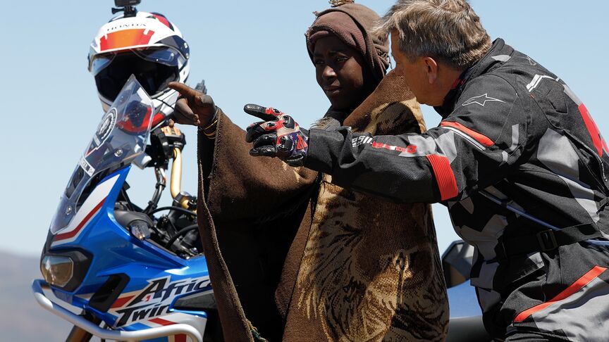 Motorbike rider riding through the tough terrains of South Africa.