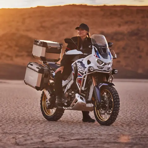 Static Honda CRF1100 ATAs in off road location.