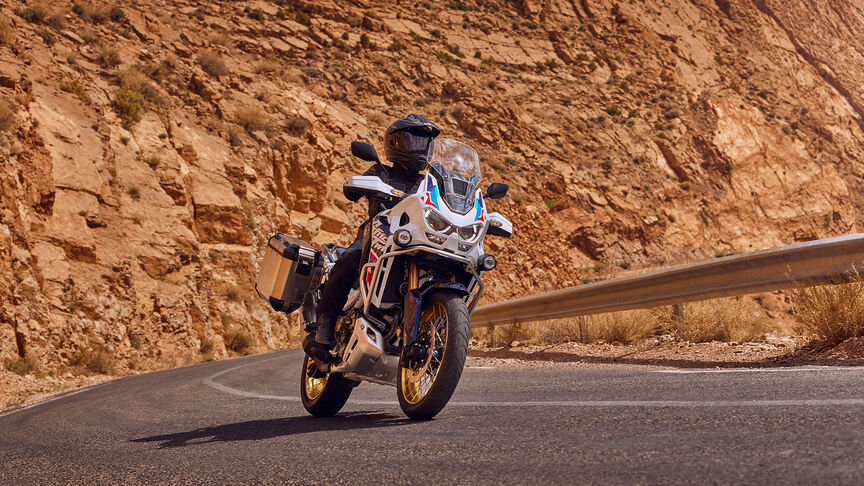 Front facing 3/4 Honda CRF1100 Africa Twin Adventure Sports in mountinous location.