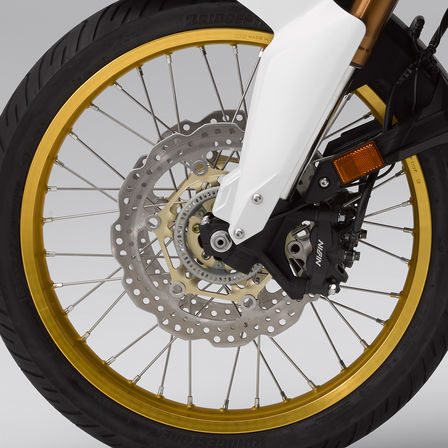 Close up of Honda Africa Twin Adventure Sports front wheel.