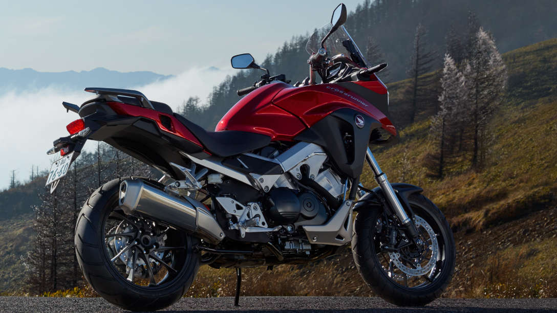 VFR800X parked on mountain road, facing right side