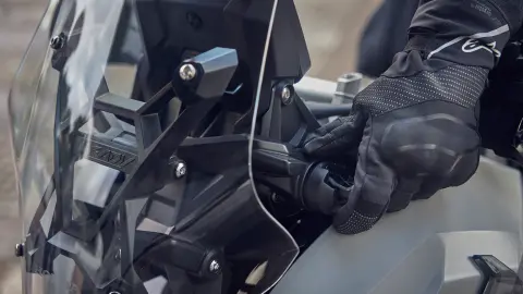 Close up of Honda X-ADV motorcycle adjustable windscreen.