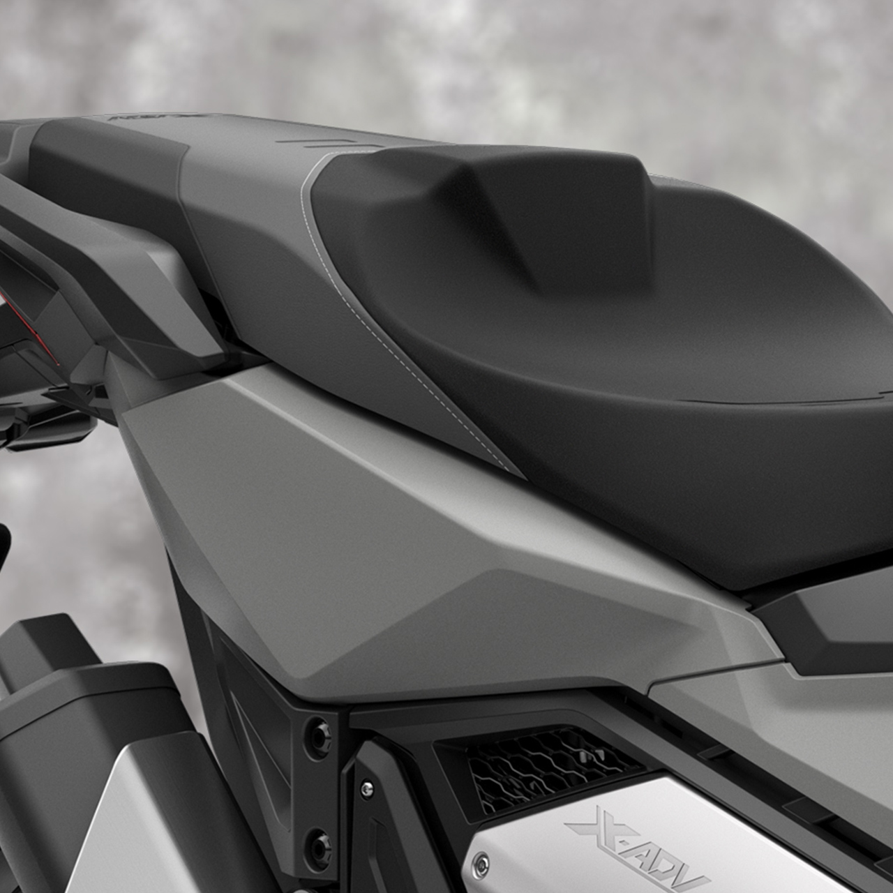 Close up of Honda X-ADV motorcycle seat.