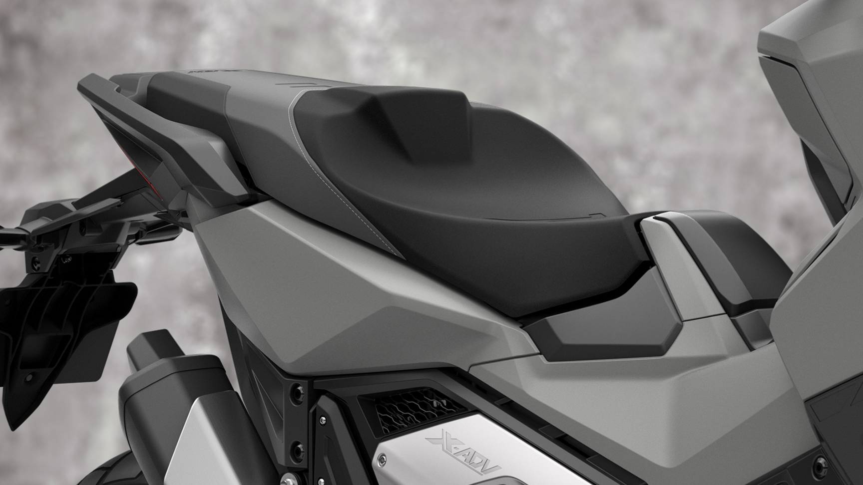 Close up of Honda X-ADV motorcycle seat.