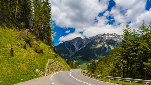 Road among Alps mountains, Klosters-Serneus, Davos, Graubuenden Switzerland
