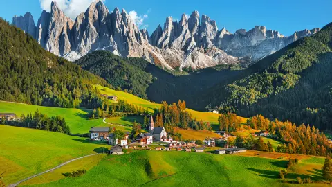 Famous alpine place Santa Maddalena village with magical Dolomites mountains in background, Val di Funes valley, Trentino Alto Adige region, Italy