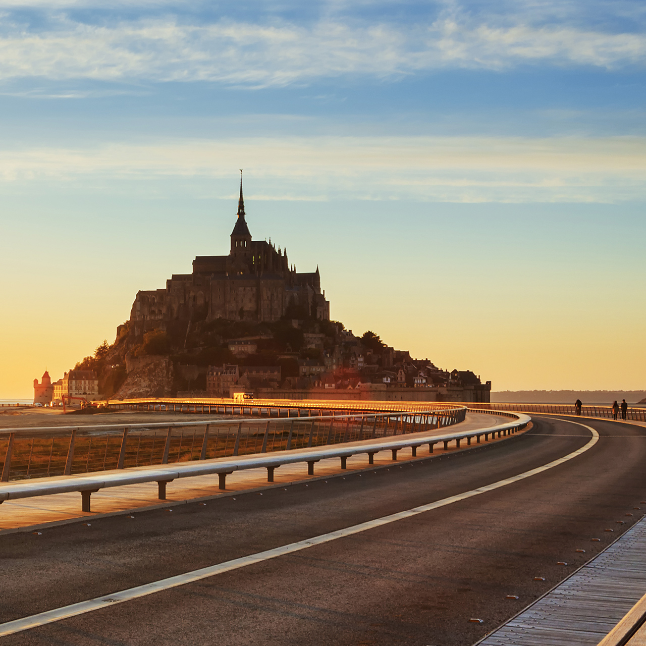 Road to Mont Saint Michel at sunset, Normandy. France.