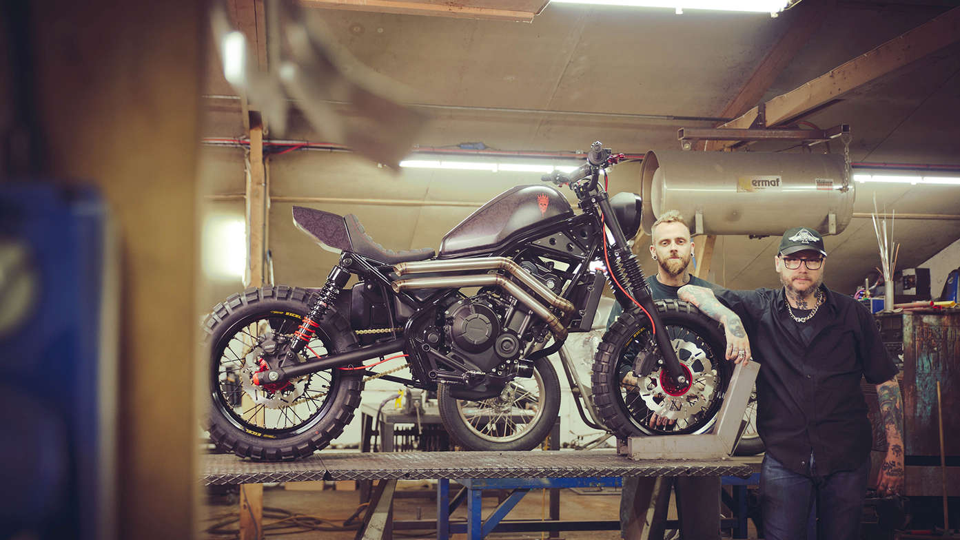 Russ Brown and Dan Gold standing next to the Custom Honda CMX500 Rebel.