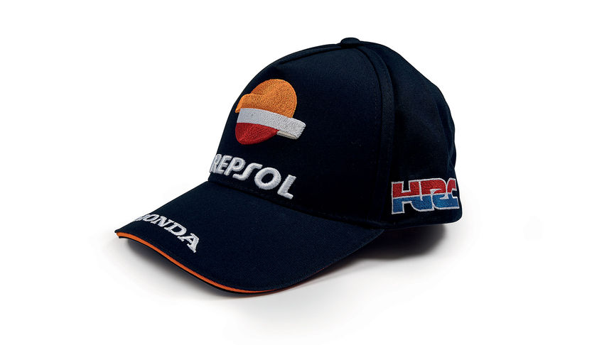 Blue cap with Honda MotoGP team colours and Repsol logo.