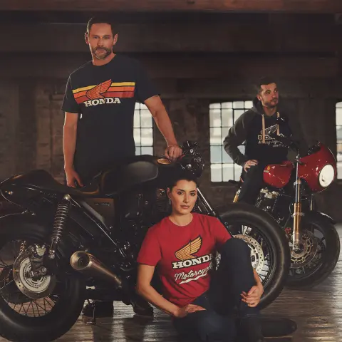 Honda Vintage clothing line-up 2024 with models on stairs with vintage bikes