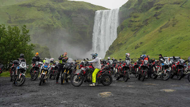 Honda adventure roads riders celebrating the end of their adventure.