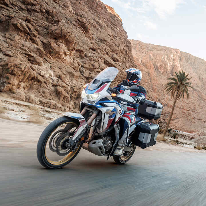 Africa Twin off-road with Touring pack and rider.