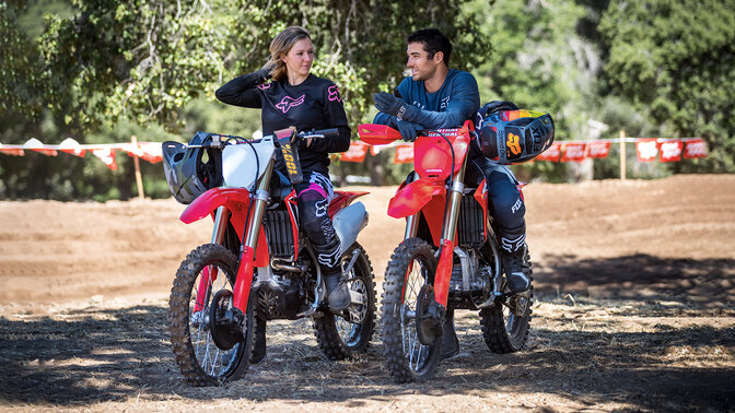 Honda CRF450RX and CRF450R static with riders