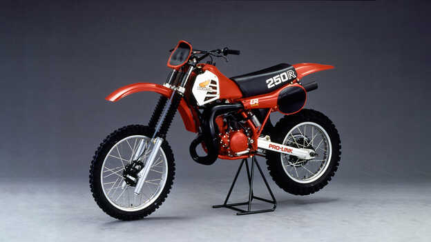 Side facing 1981 Honda CR250R in the studio.