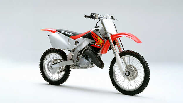 Side facing Honda 1997 CR250R in the studio. 