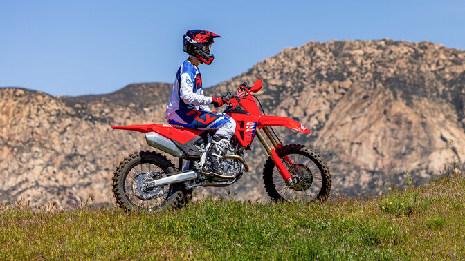 Honda CRF250R on MX track doing jump
