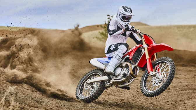 Honda CRF450R on track with Motorcross rider