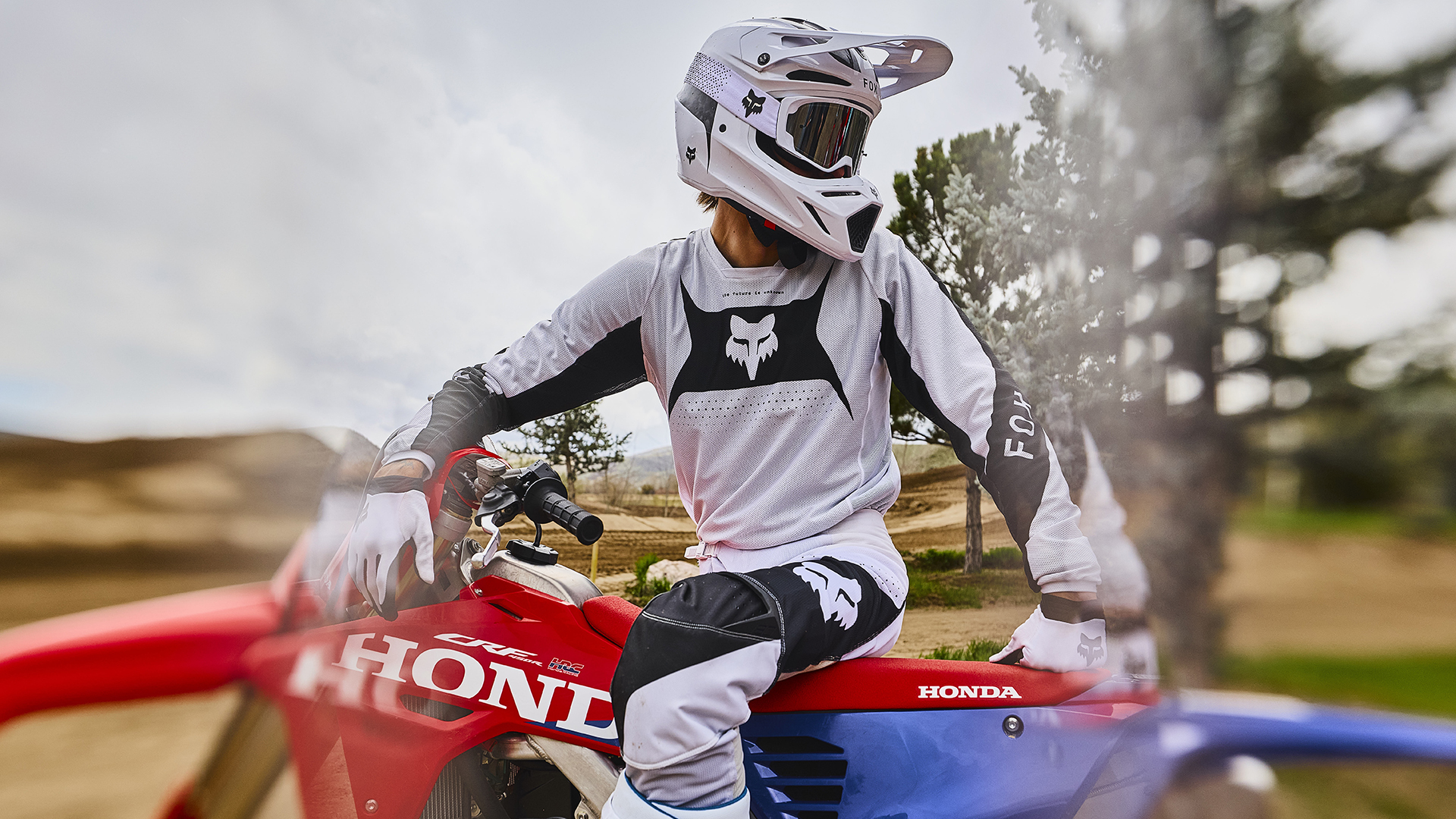 CRF450R on track with motorcross rider