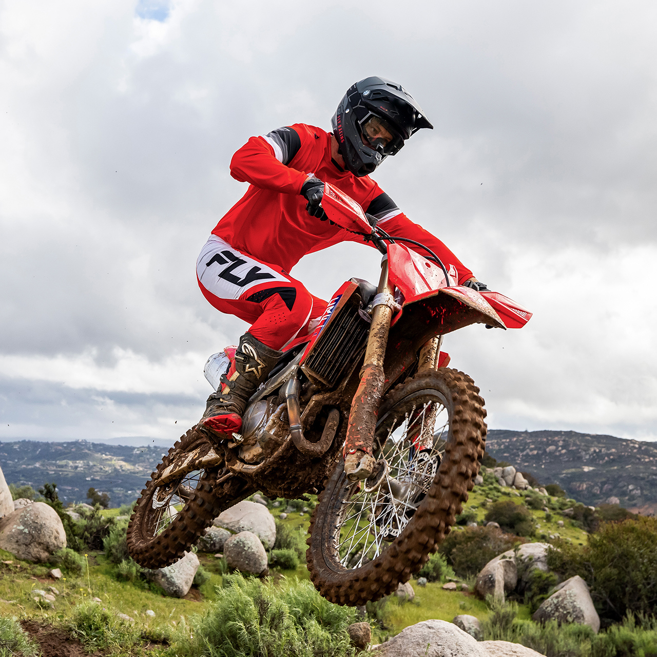 CRF450R on track with motorcross rider