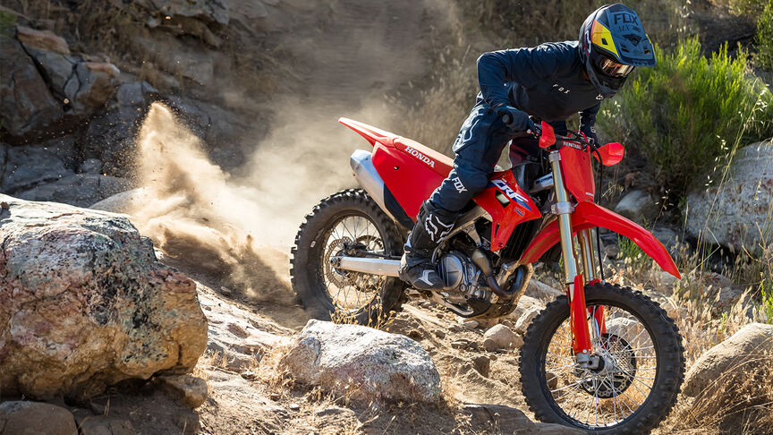 Honda CRF450RX on an off road trail.