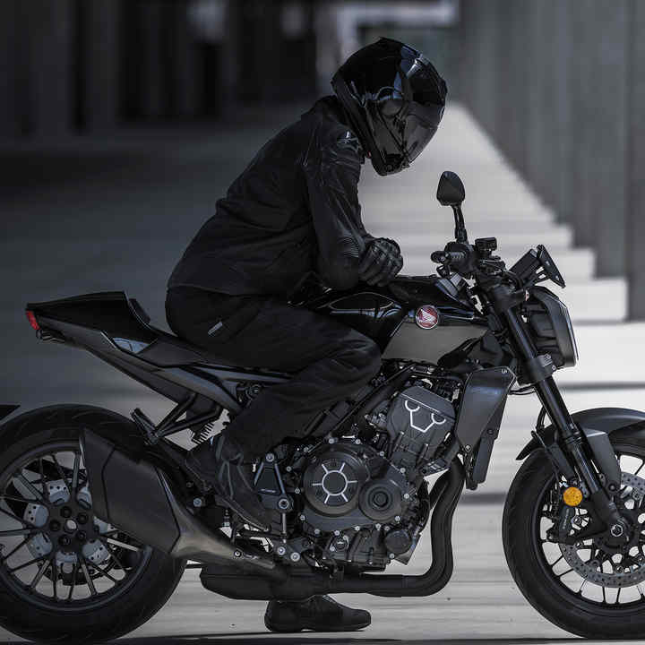 Honda CB1000R Black Edition, static, right side, with rider