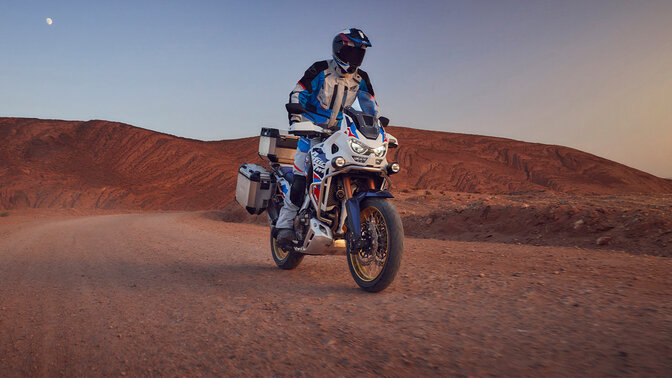 Honda Vintage clothing model with hoodie on bike