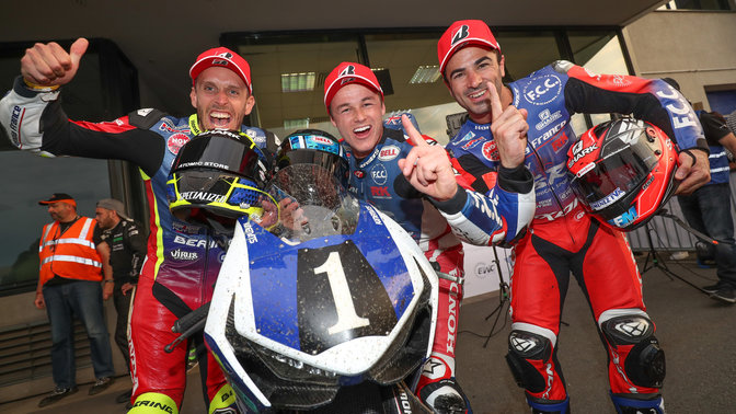 Honda EWC riders celebrating.