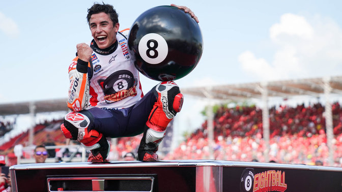 Honda MotoGP rider Marc Marquez celebrating race victory.