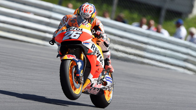 Front three-quarter facing Honda Fireblade in a MotoGP race.